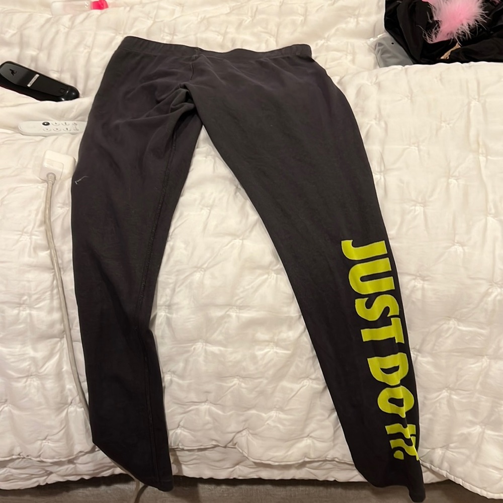 Gray and neon green Nike leggings